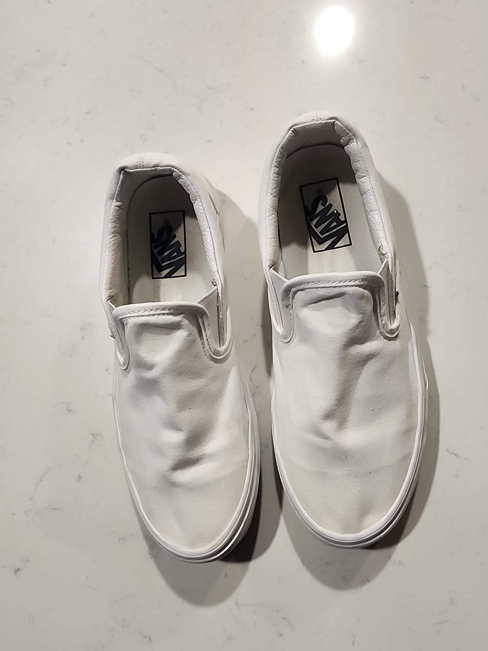 Vans Women's White Slip-On Canvas Loafers